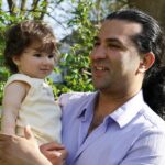 Udit Bharadwaj, meditation teacher, with his daughter
